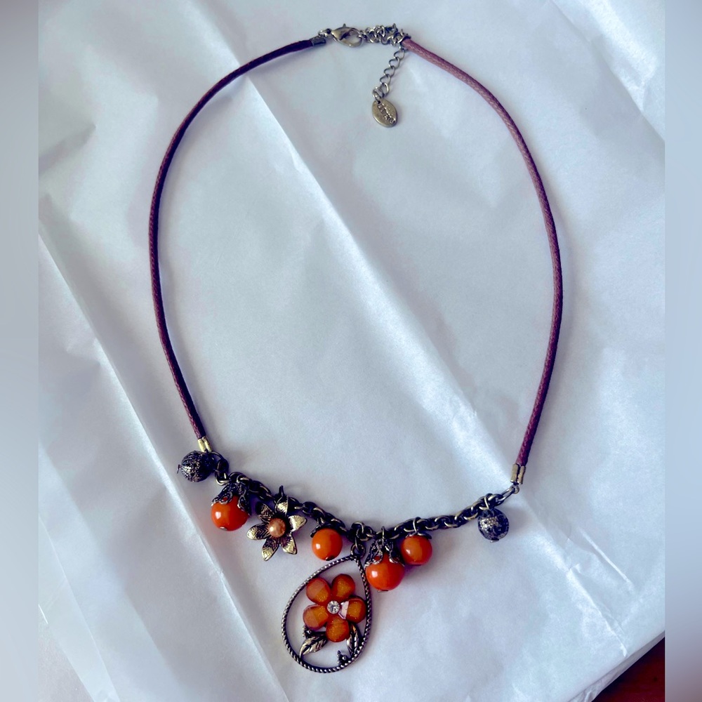 Claire’s Orange Flower Necklace with Leather Band